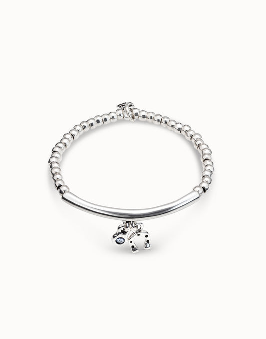 Pulsera elástica bañada en plata de ley con túbulo y charms