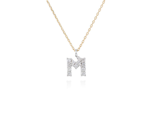 Colgante letra M de diamantes en oro amarillo y blanco 18kt